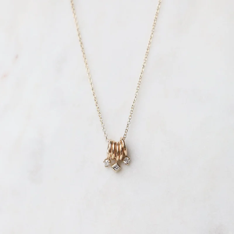 Statement Long Chain Necklaces For Bold Fashion-14k Gold 5 Tiny Rings Necklace with Mixed Diamonds