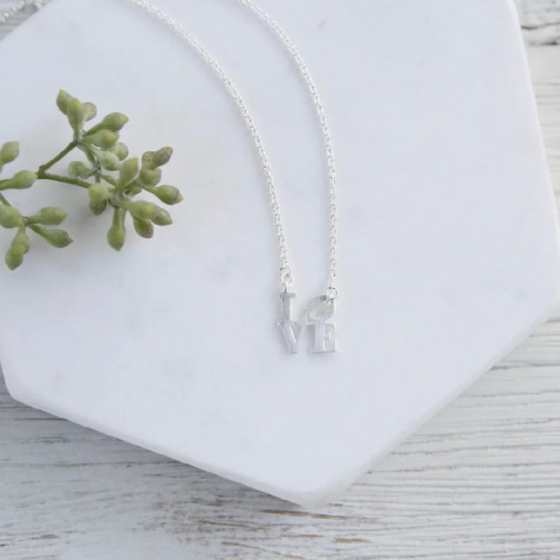 Classic Silver Necklaces For Timeless Fashion-Matte Silver Mini LOVE Necklace