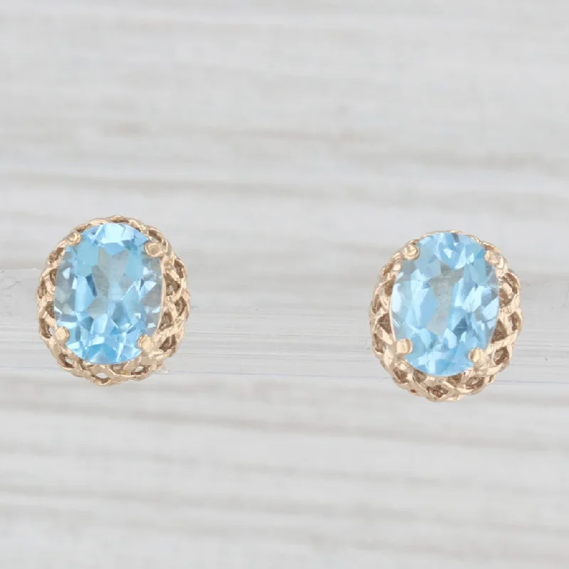 Stylish Hoop Earrings For Casual Looks-2.80ctw Oval Solitaire Blue Topaz Stud Earrings 10k Yellow Gold