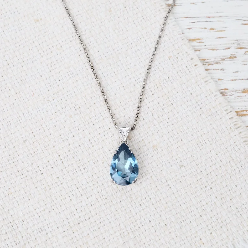 Layered Gold Necklaces For Bold Fashion-Pear London Blue Topaz Pendant Necklace