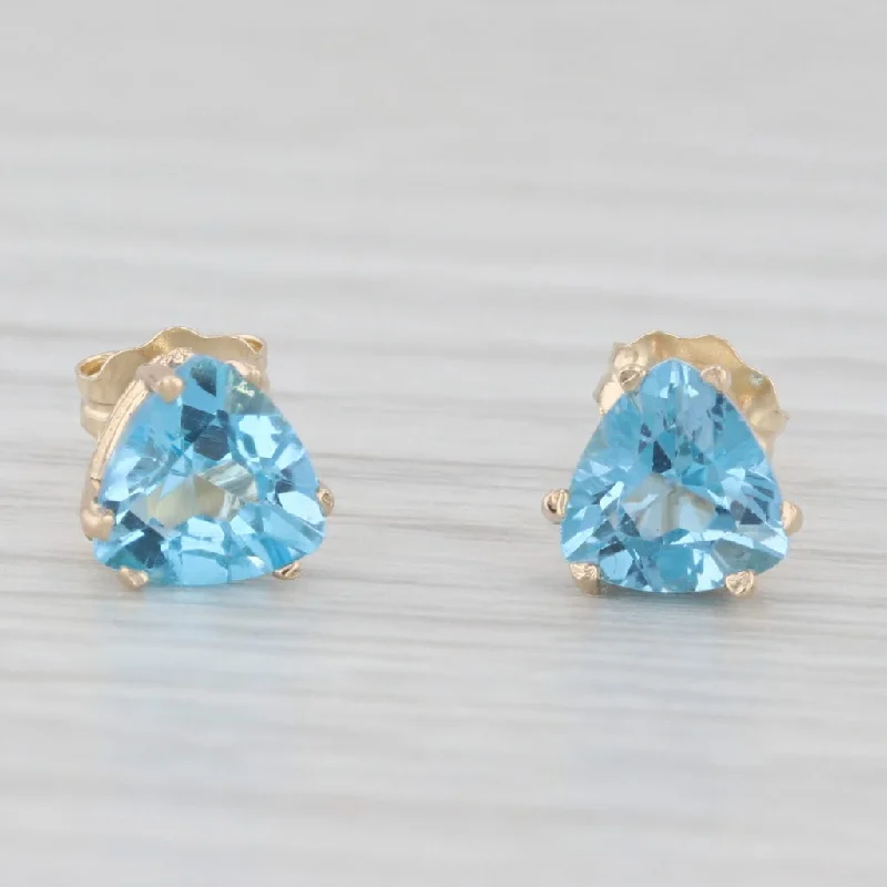 Cute Flower Earrings For Summer-2ctw Blue Topaz Stud Earrings 10k Yellow Gold Trillion Solitaires