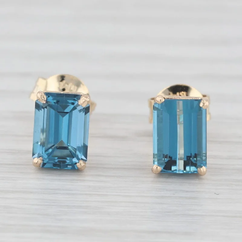 Classic Silver Earrings For Simple Style-2.60ctw London Blue Topaz Stud Earrings 14k Yellow Gold Emerald Cut Solitaires