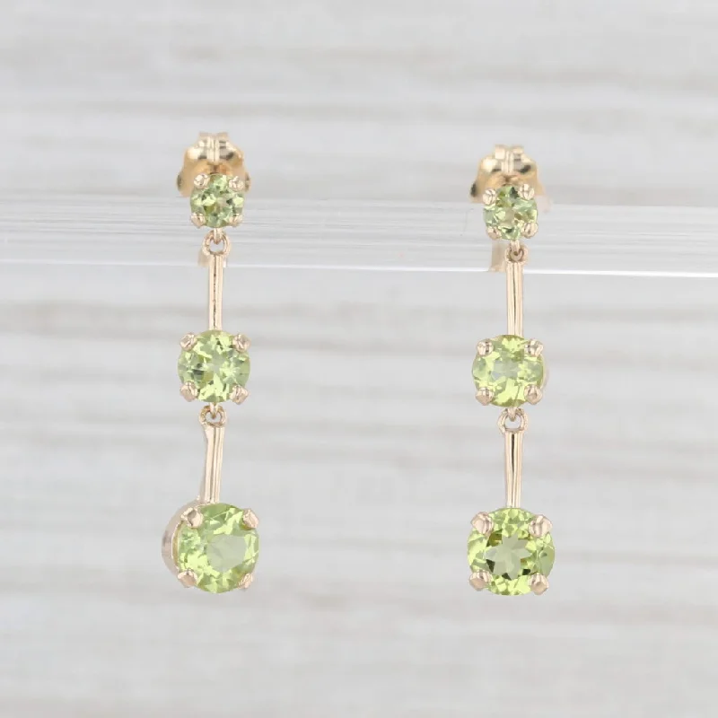 Modern Earrings For Urban Fashion-1.85ctw Peridot Graduated 3-Stone Dangle Earrings 10k Yellow Gold